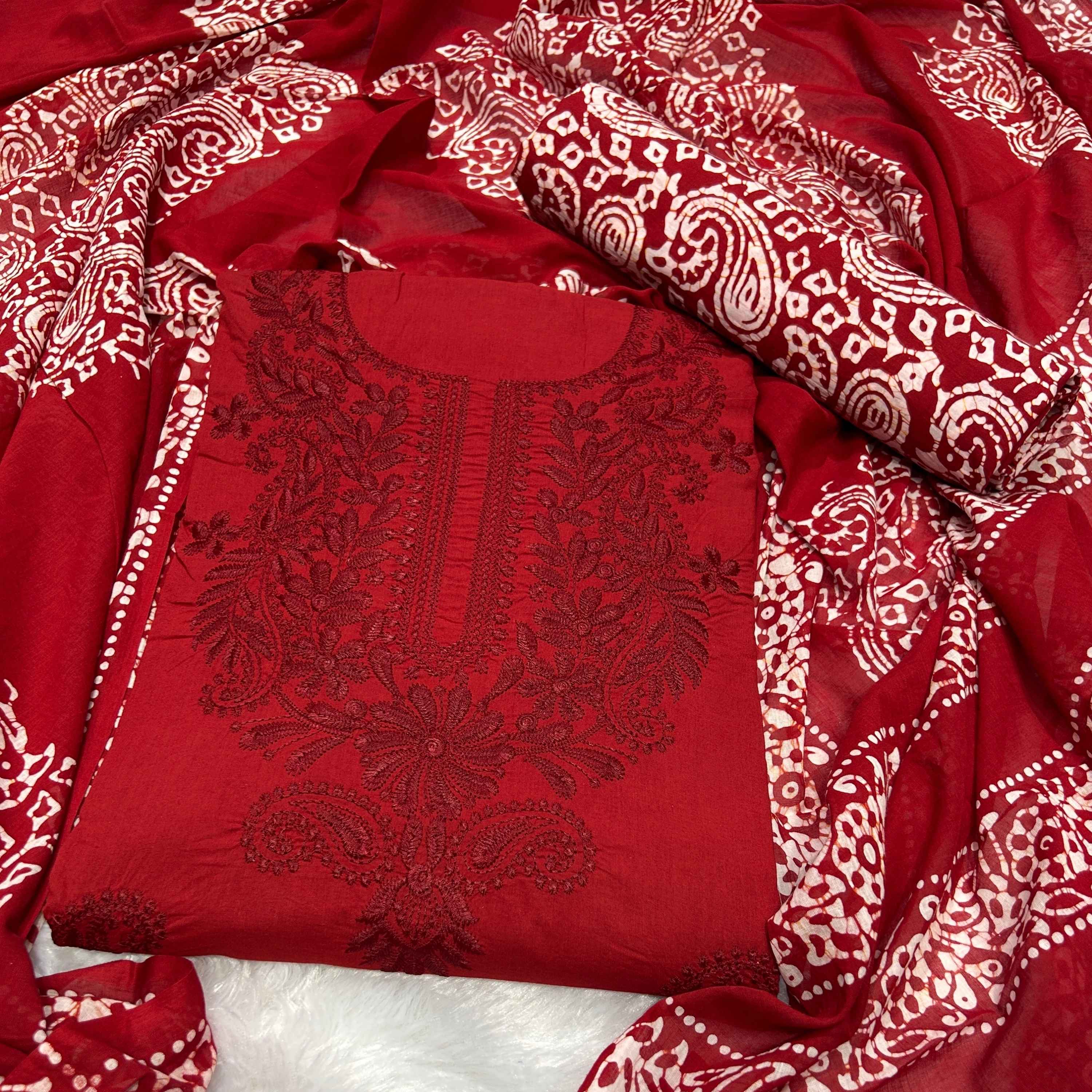 Red embroidered lucknowi with cotton fabric featuring batik prints